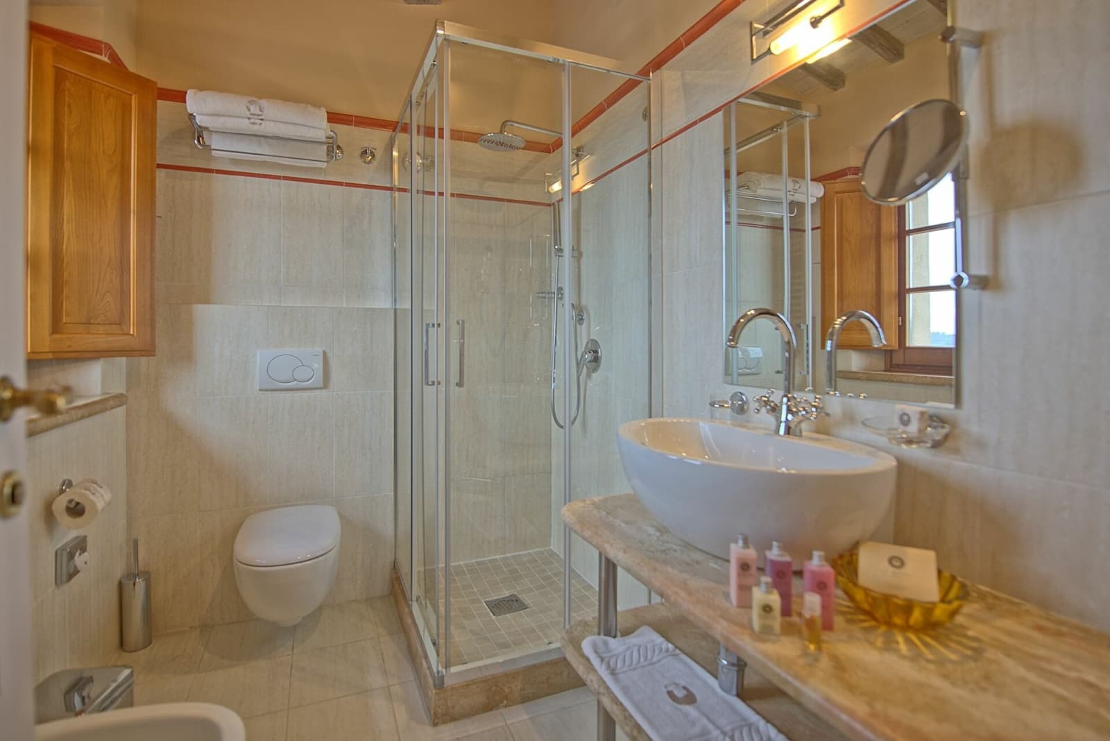 Tenuta La Barricaia — a glass-walled shower in an en-suite