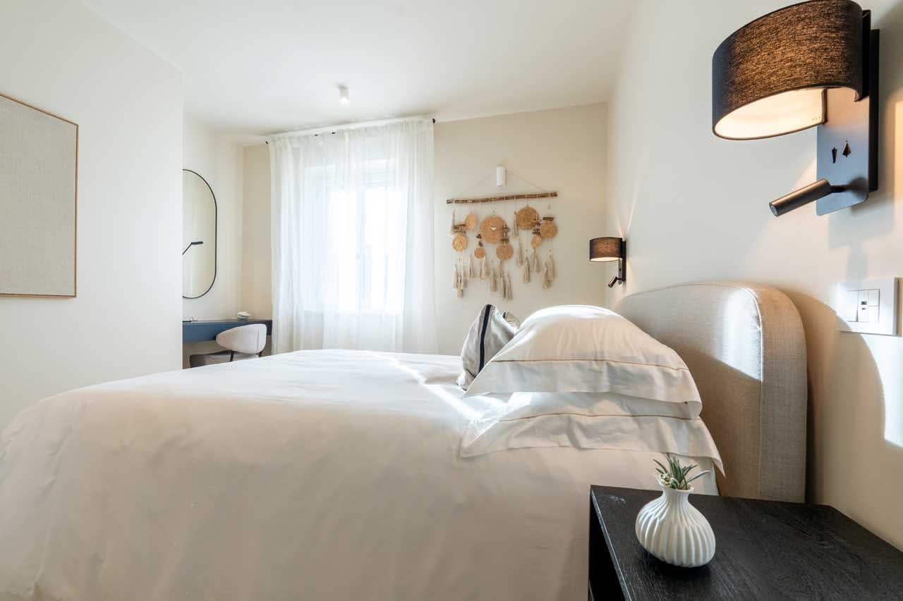 Tenuta Belvedere Estate: Tenuta Belvedere — a suite double bedroom