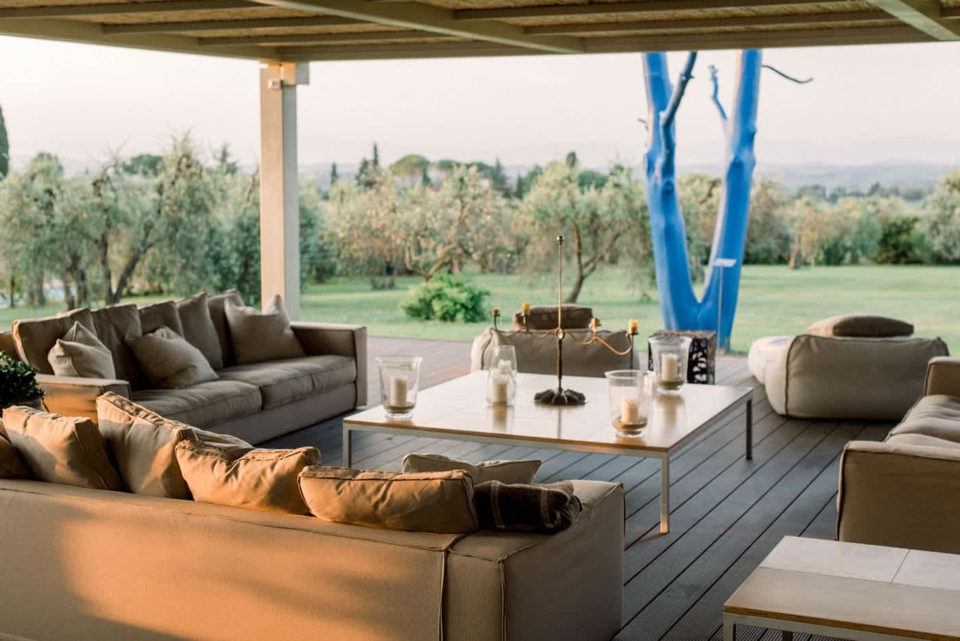 Villa Castellaro — the lounge under the pool pergola