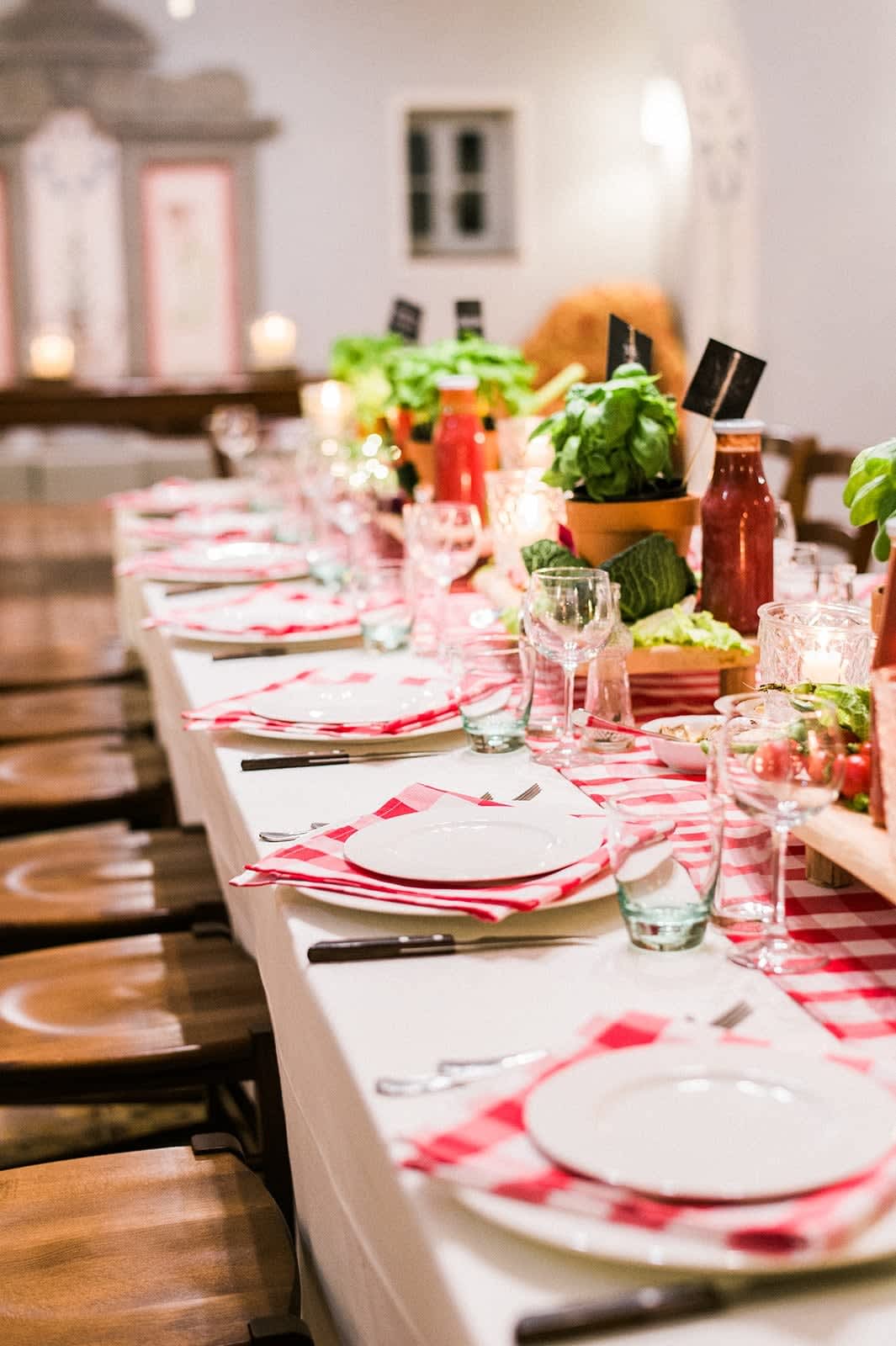 Villa della Cappella — a long table set for an alfresco Tuscan dinner