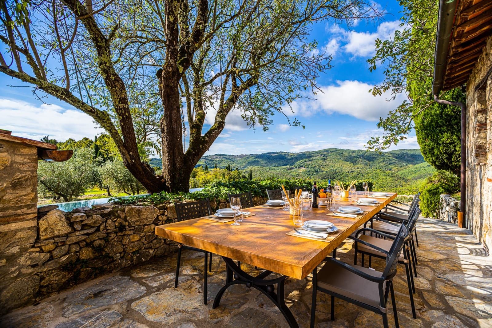 Casa dell'Erta — a terrace table over the hills