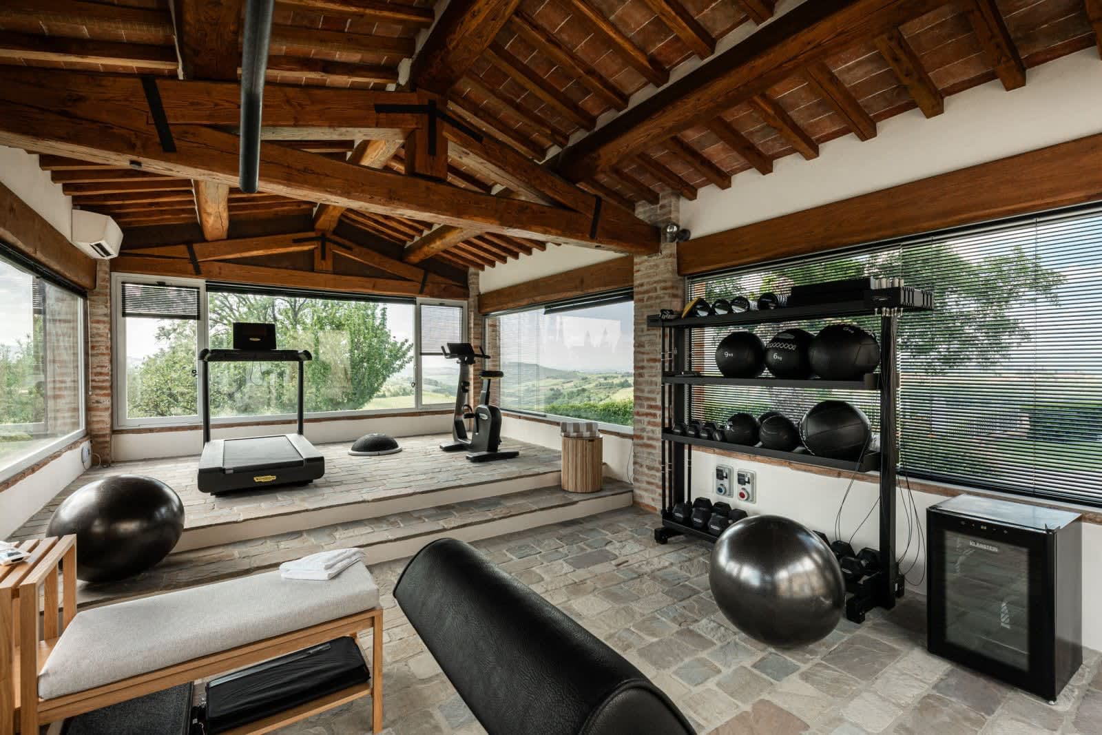 Villa Fornacella — the gym's panoramic windows