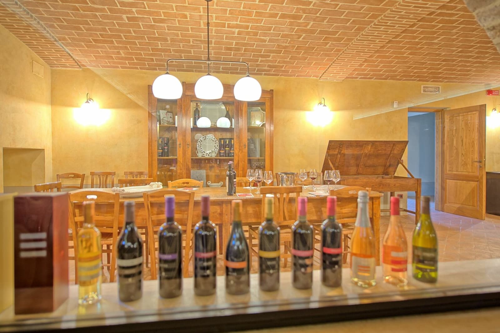 Tenuta La Barricaia — the estate's wines on display in the tasting room
