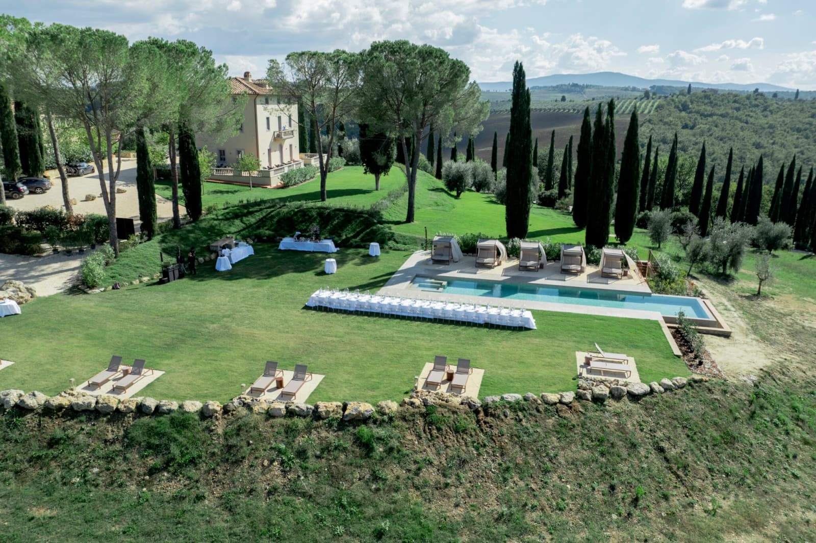 Tenuta Belvedere Estate: Tenuta Belvedere — the lawn, pool and villa from above