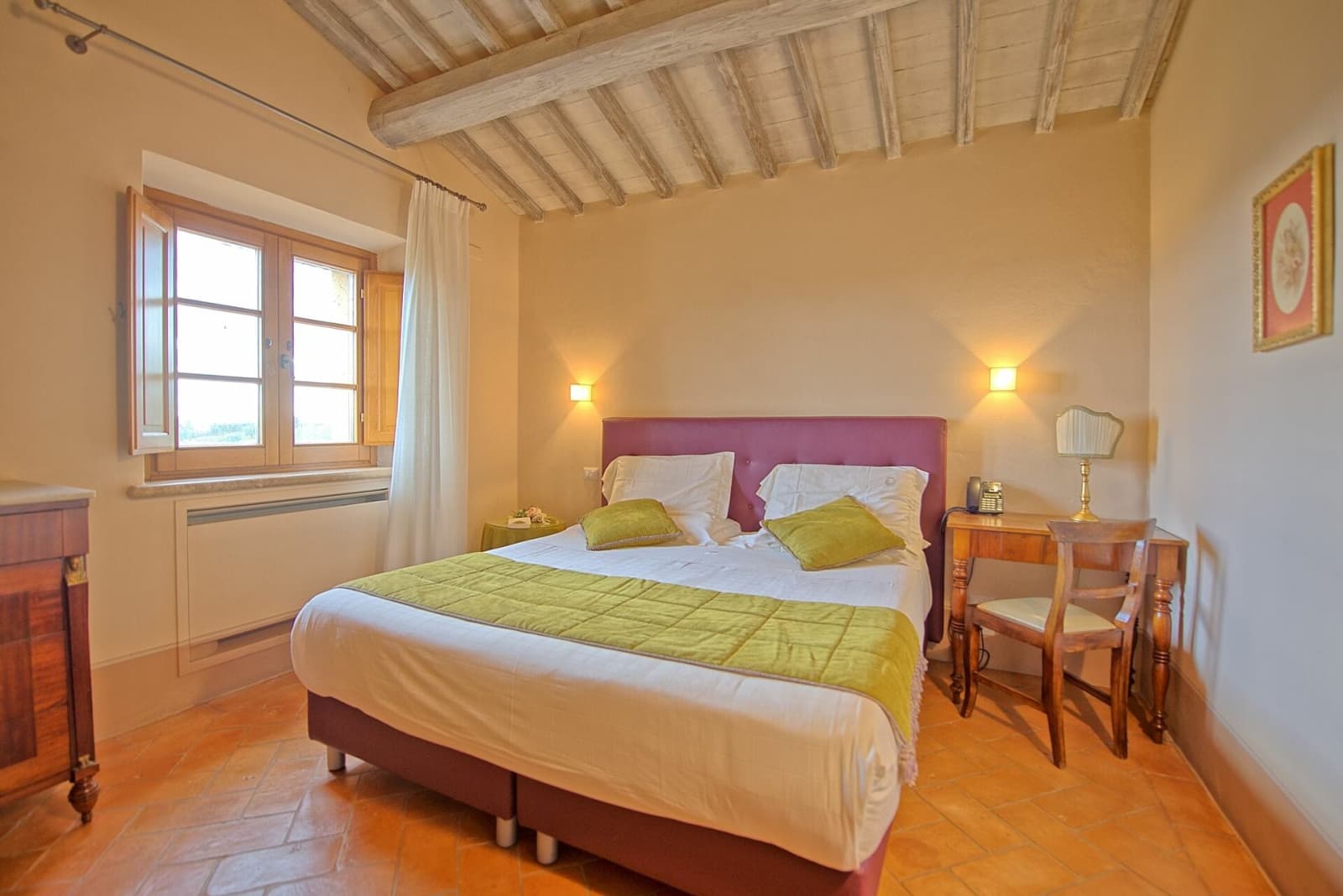 Tenuta La Barricaia — a double bedroom with a writing desk