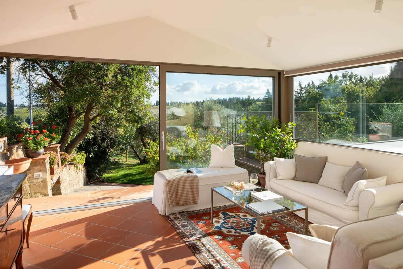 Casa Lilia — sofas facing the garden view