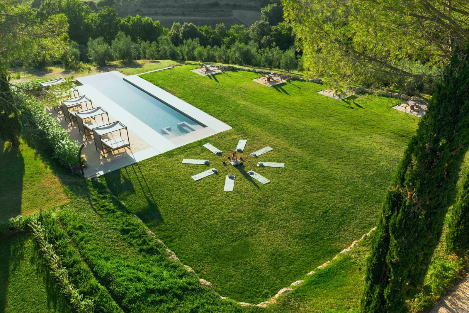 Tenuta Belvedere Estate: Tenuta Belvedere — the saltwater pool and lawn