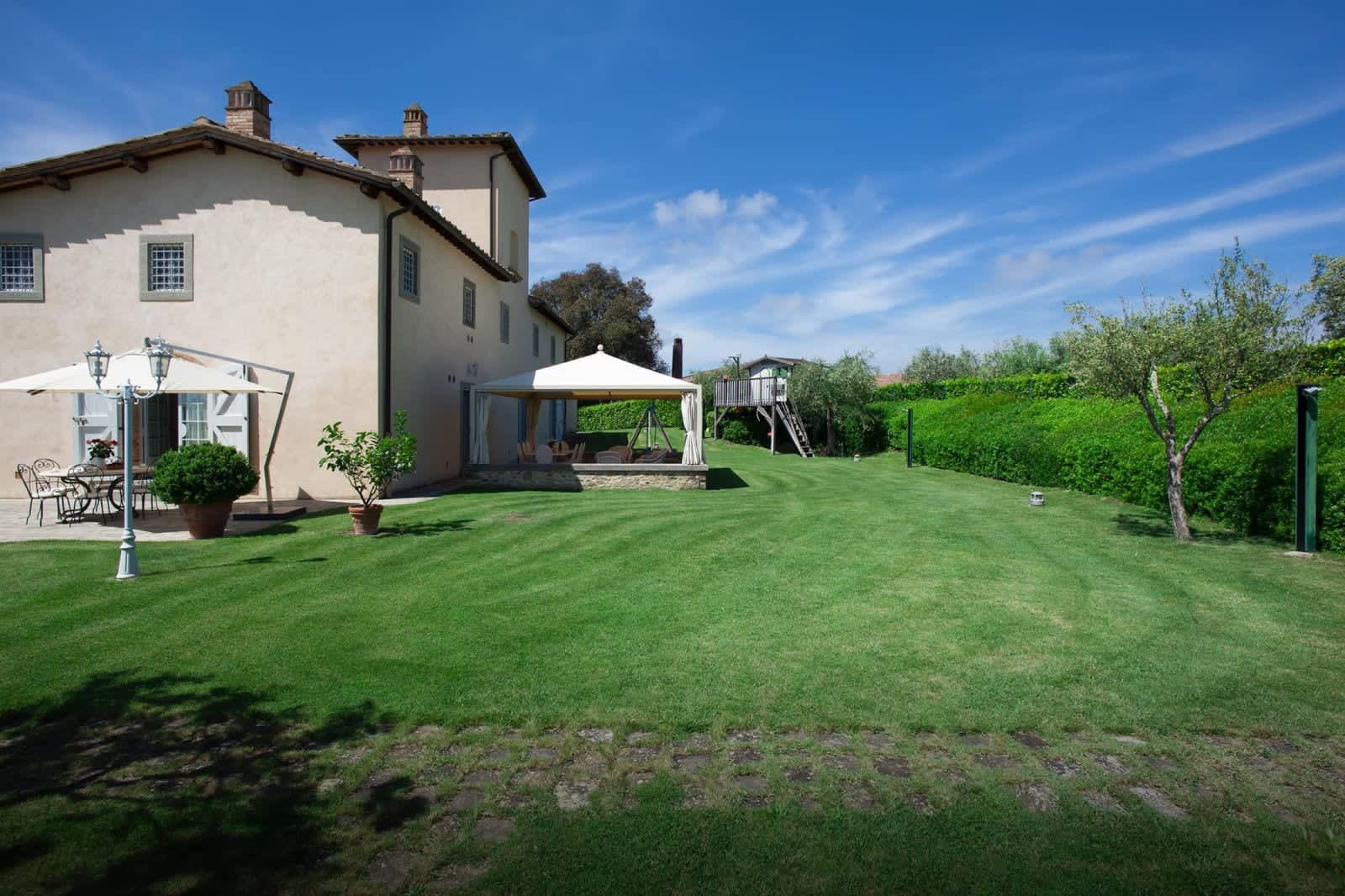 Villa Fornacella — the villa beyond the lawn