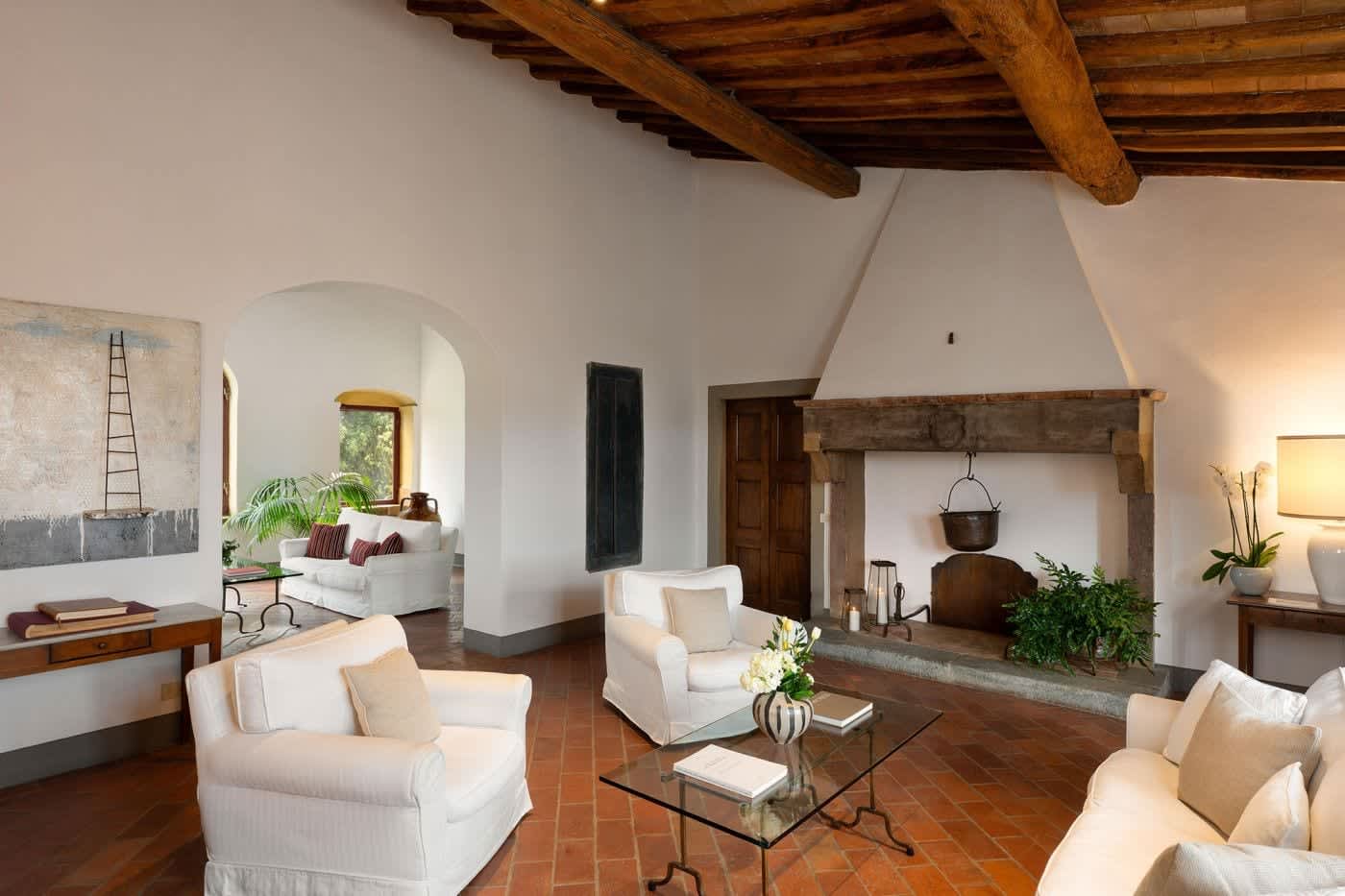 Villa Castellaro — the living room's great stone fireplace