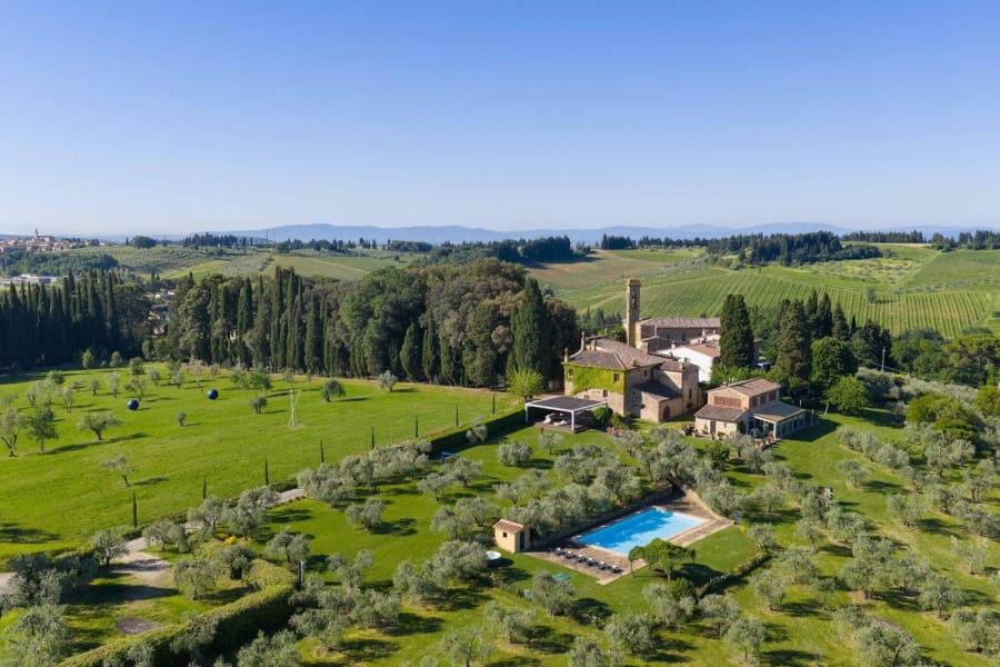 Villa Castellaro — the villa, its gardens and pool among the olive groves from above