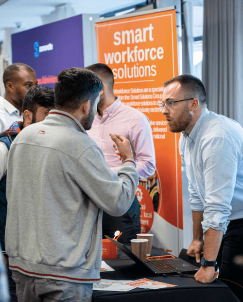 Candidates meeting employers at a UK Careers Fair