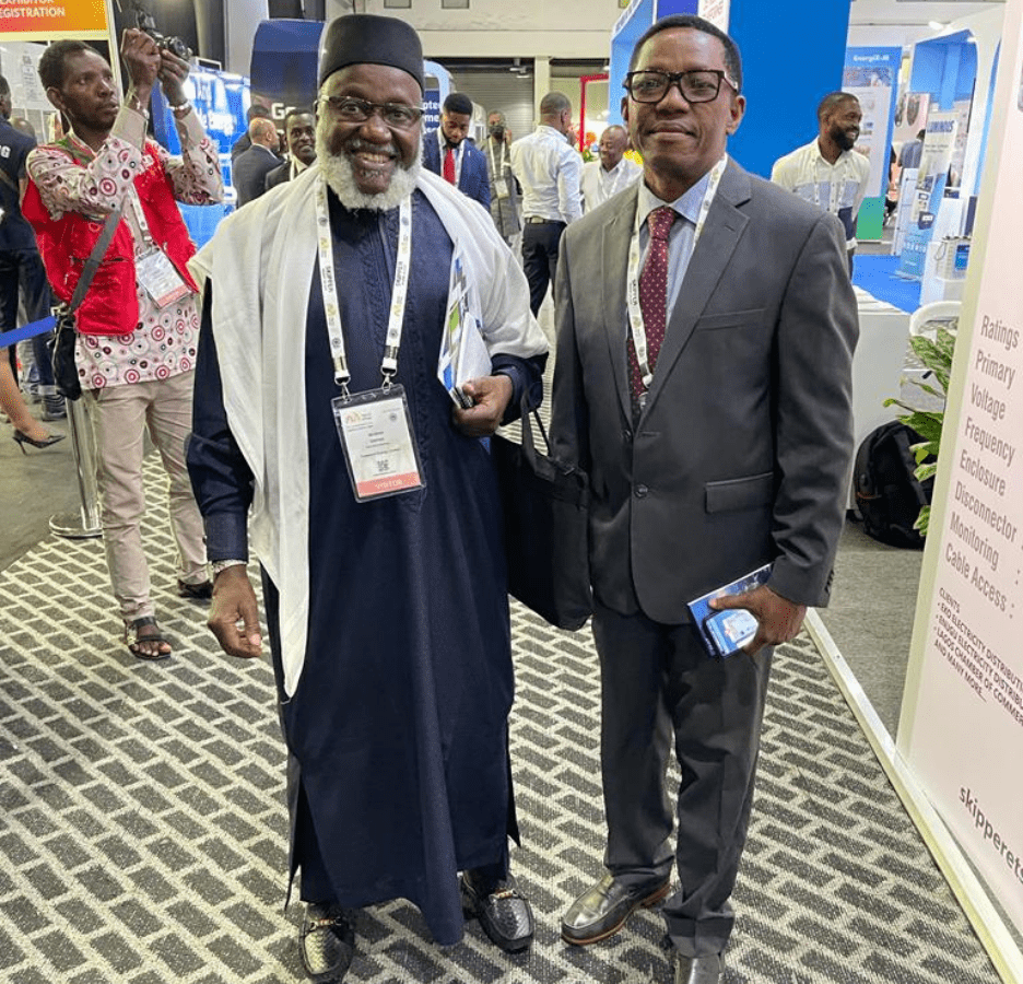 The President at the Lagos Trade Fair with Mr Mba-Sam Oweh, Managing Director and Chief Executive of Manufacturers Power Development Company Limited