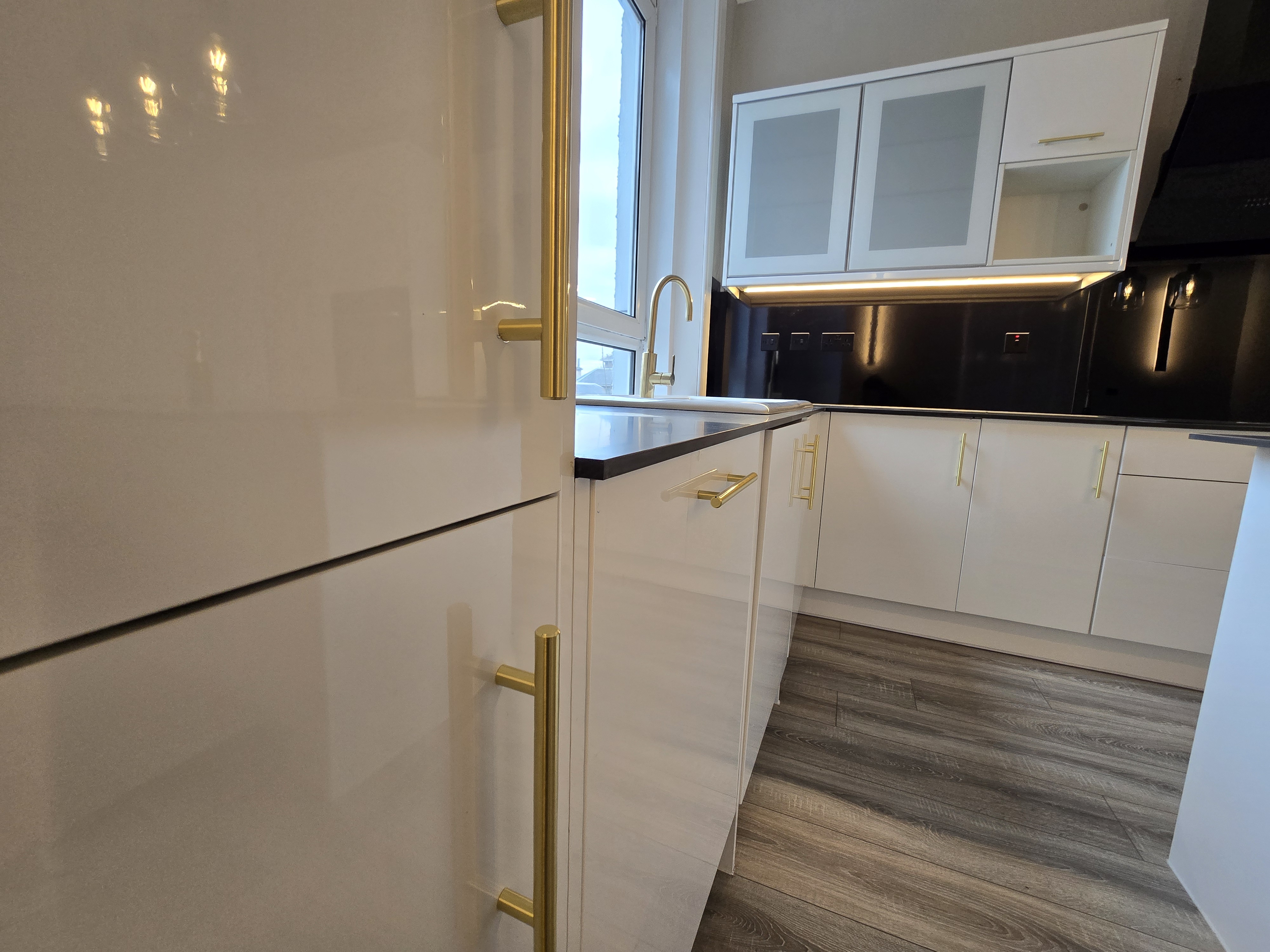 Bedroom after refurbishment with feature LED wall sconces — full property renovation Wishaw, Murphy Project Management Scotland