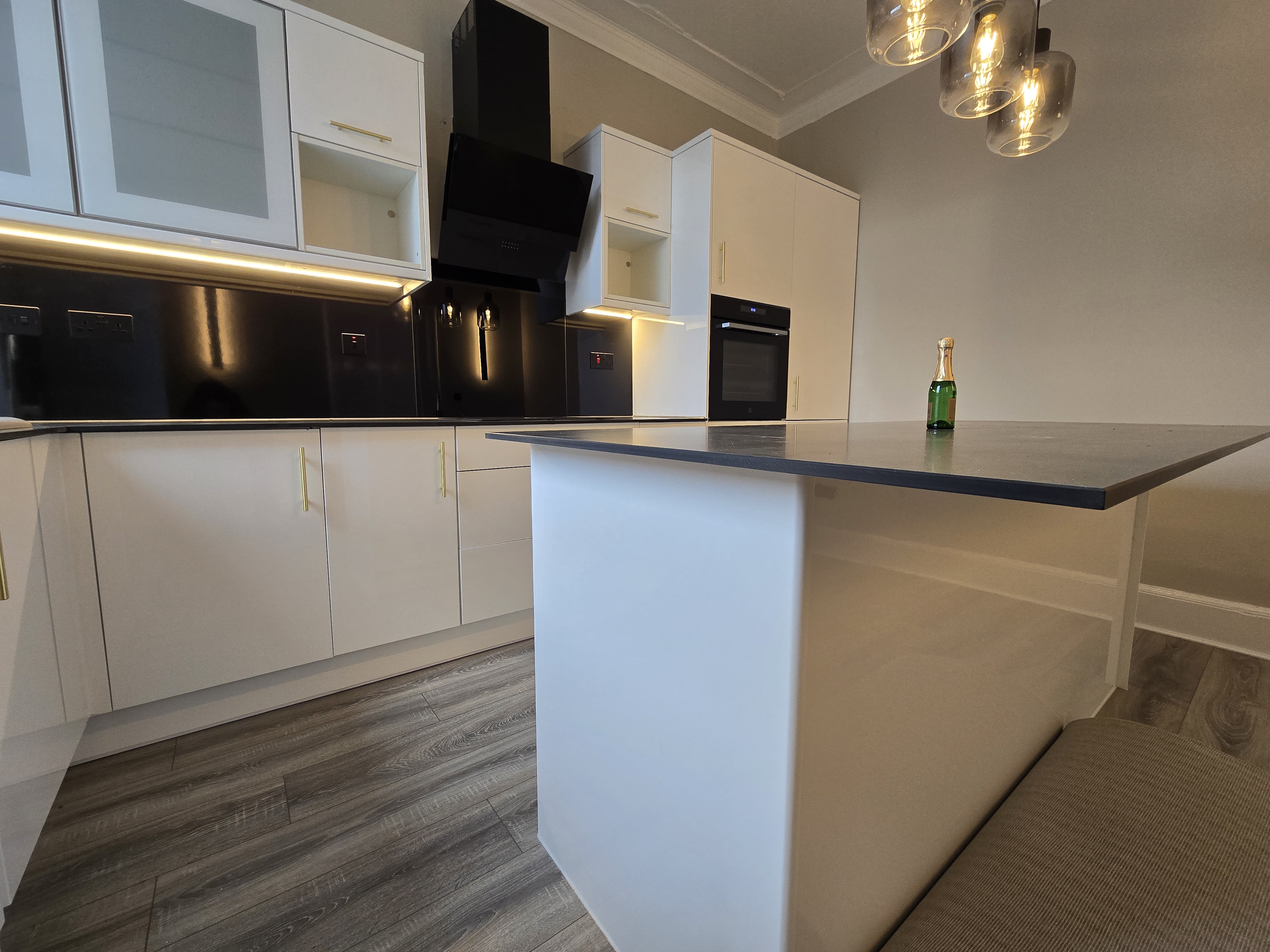 Open plan kitchen with island — investor property refurbishment Wishaw, project managed by Murphy PM Glasgow
