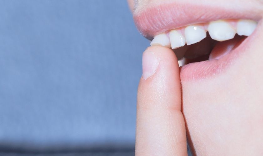 How to Tighten a Loose Tooth at Home