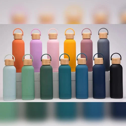 Stainless steel insulated water bottle with a wooden lid and handle 500ml 3