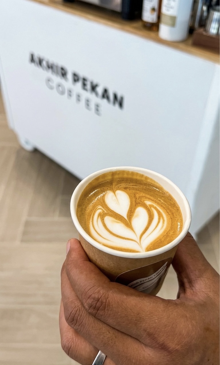 Barista pouring latte art