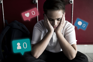 Unhappy teenager with no Social media engagement