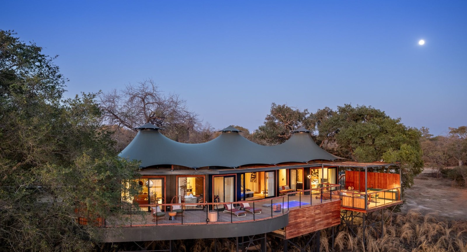 Kafue Pool Villa at dusk, Anantara Tented Camp Kafue River