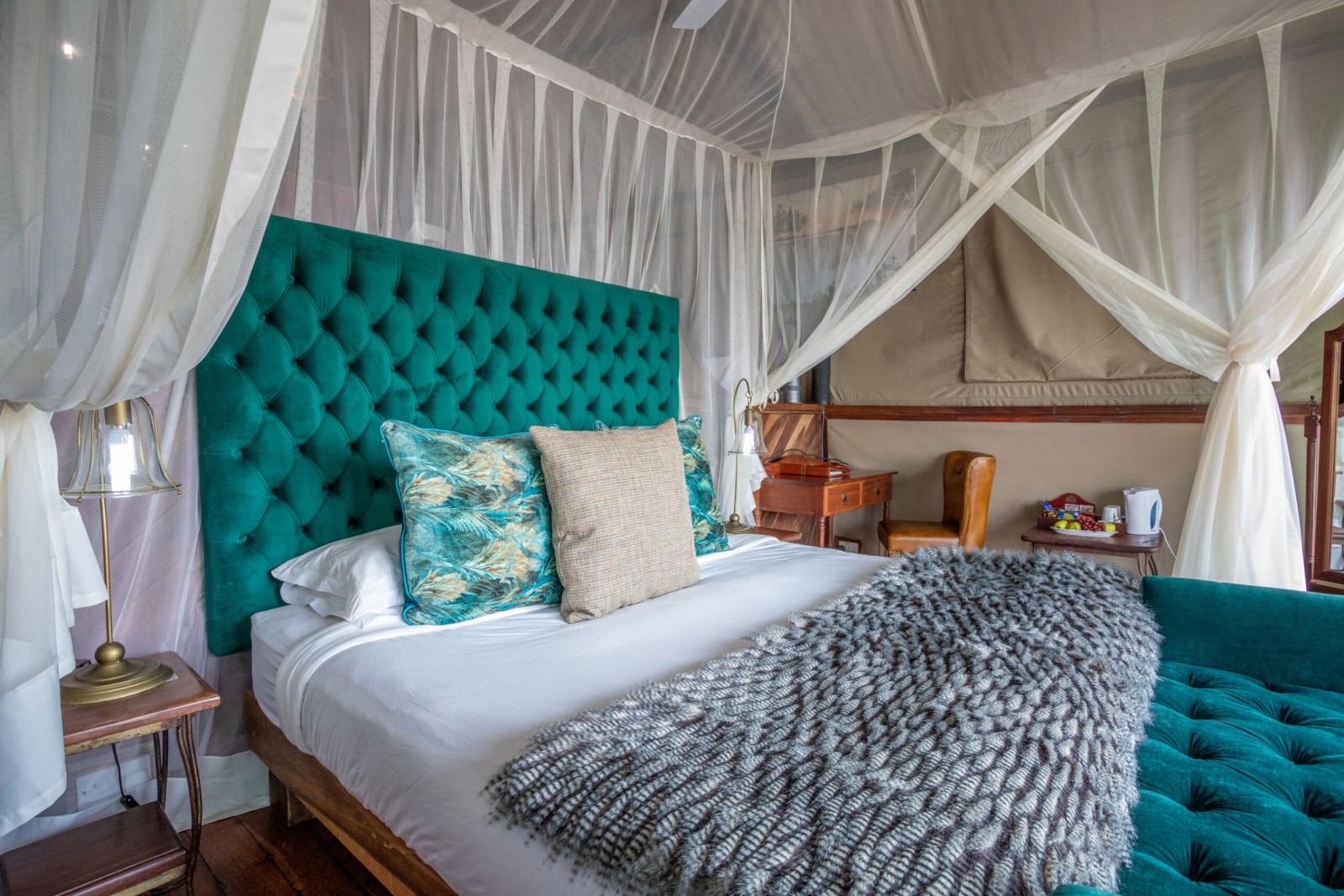 Honeymoon Suite bed under mosquito netting, Islands of Siankaba