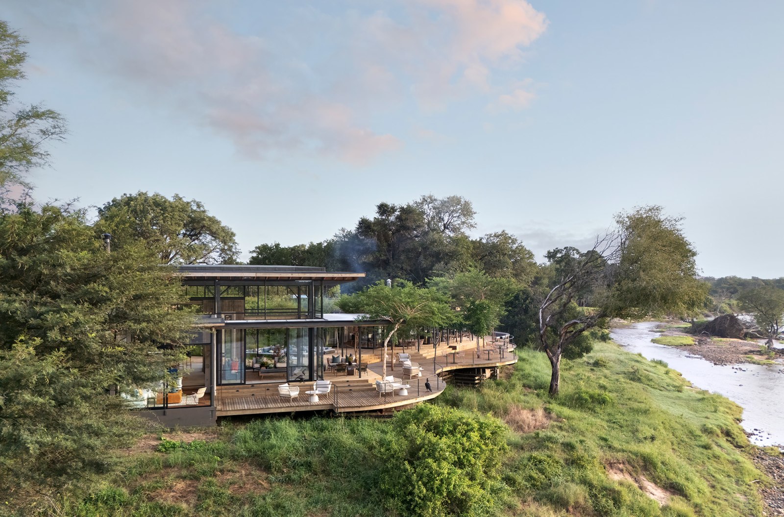 The lodge on the bank of the Sabie River, Lion Sands Ivory Lodge