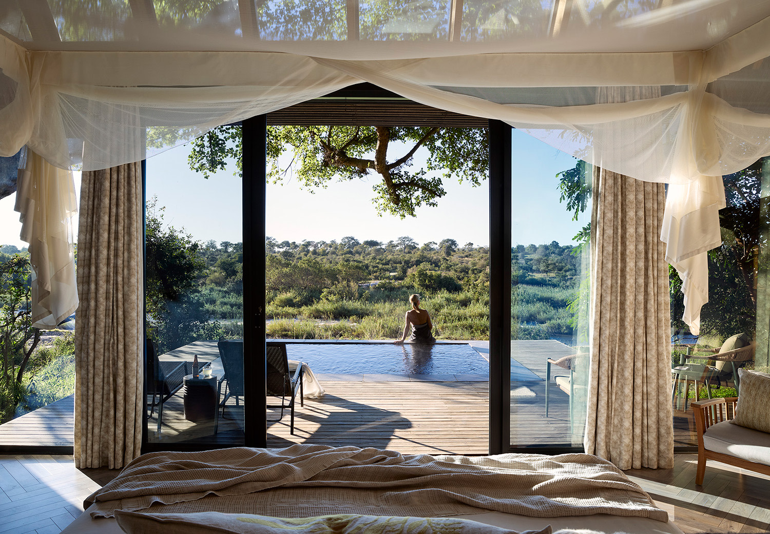 River Suite bedroom and plunge pool, Lion Sands River Lodge
