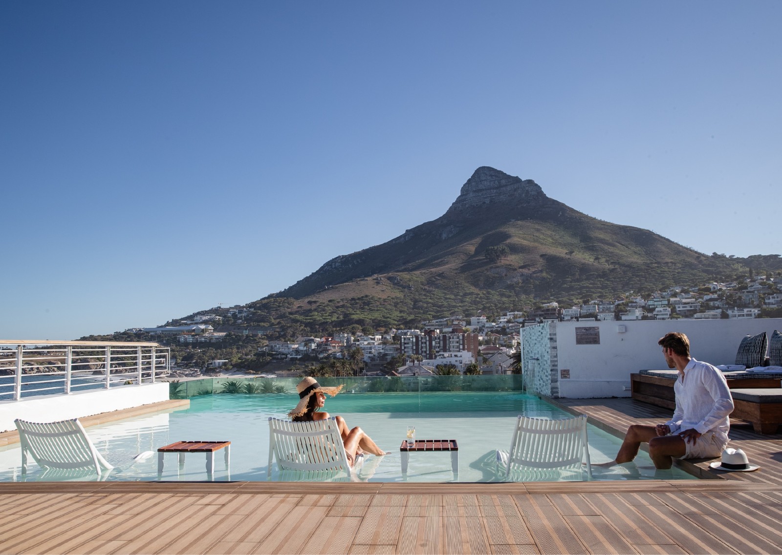 Rooftop infinity pool with Lion's Head behind