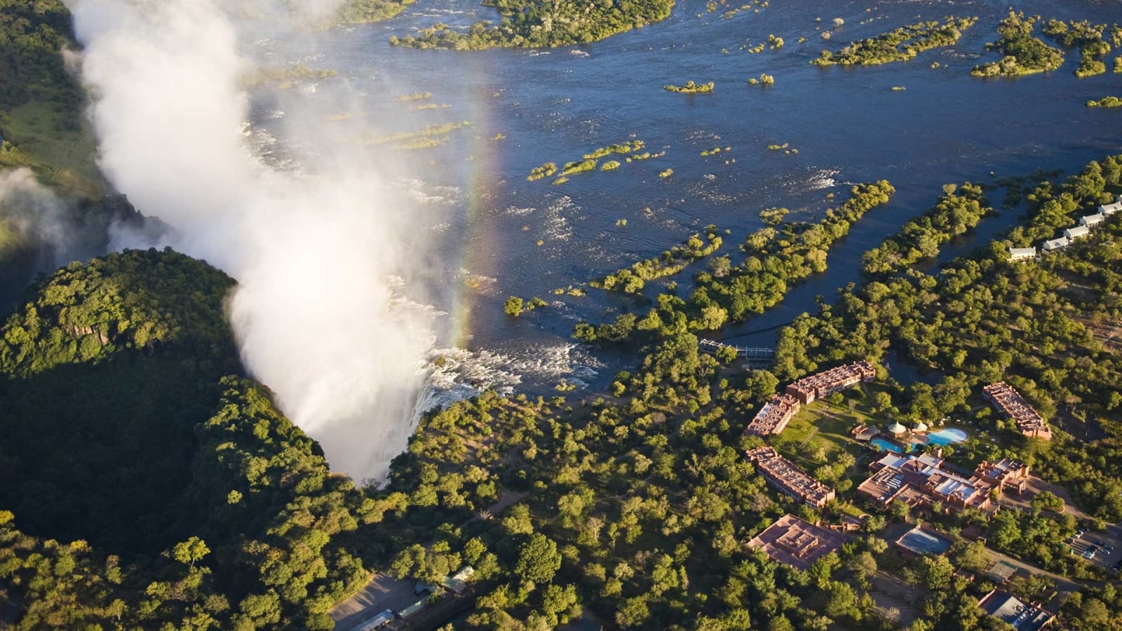 Aerial view of the resort beside Victoria Falls and the Zambezi, Avani Victoria Falls Resort