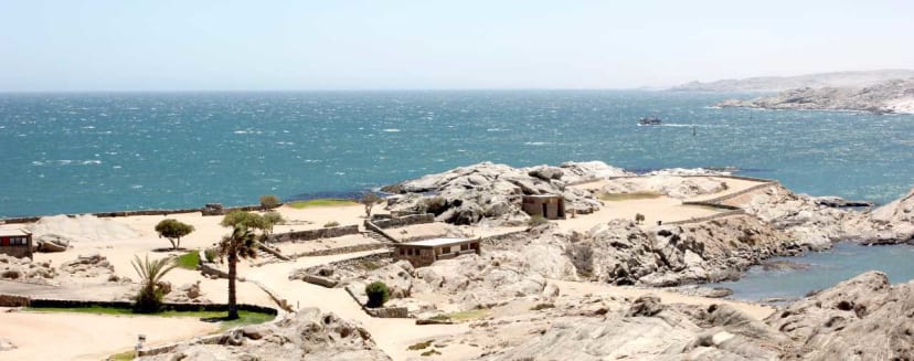 A campsite among granite rocks beside the sea