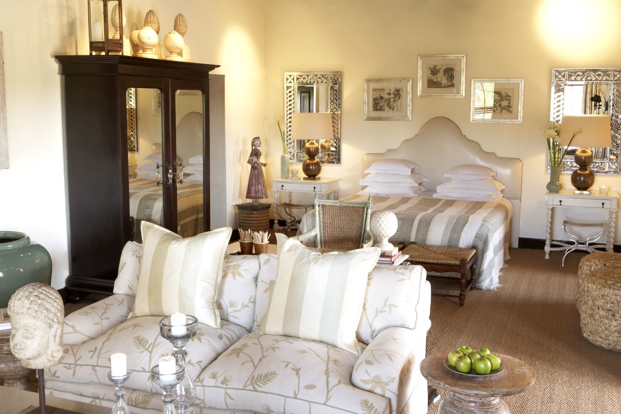 Deluxe Room bed and seating area
