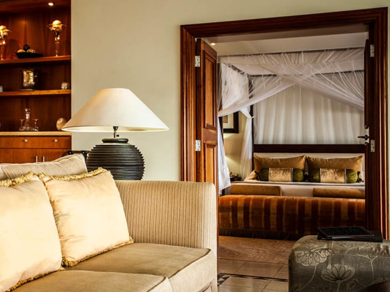 Anantara Pool Villa sitting room with view into the bedroom, Anantara Bazaruto Island Resort