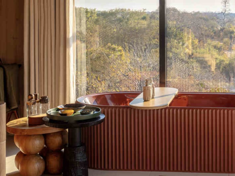 Horizon Terrace Suite bathtub with woodland view, Anantara Tented Camp Kafue River