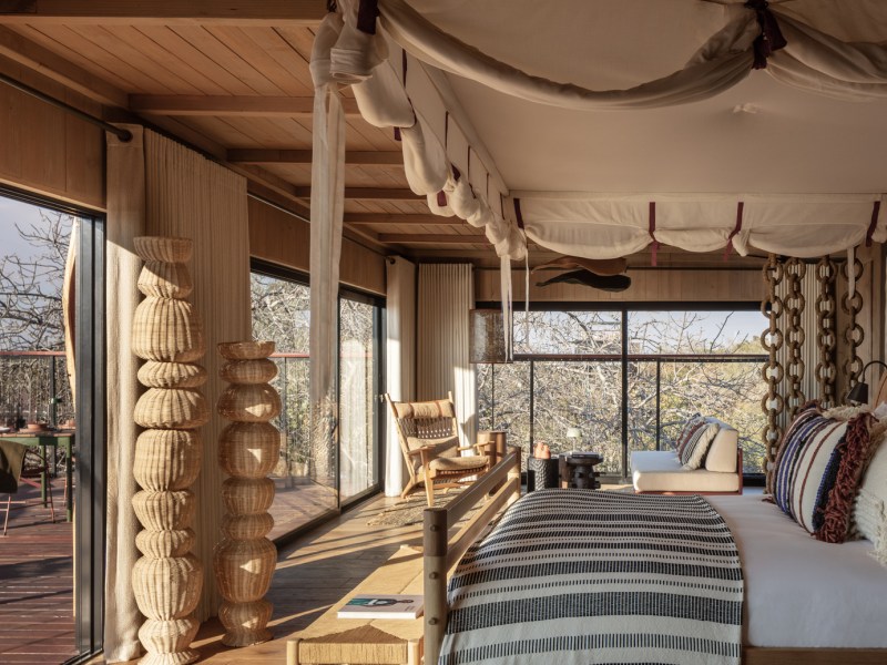 Horizon Terrace Suite bedroom with mosquito net, Anantara Tented Camp Kafue River