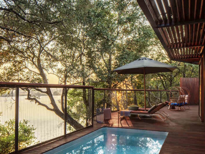 Kafue Pool Villa terrace and pool in the morning, Anantara Tented Camp Kafue River
