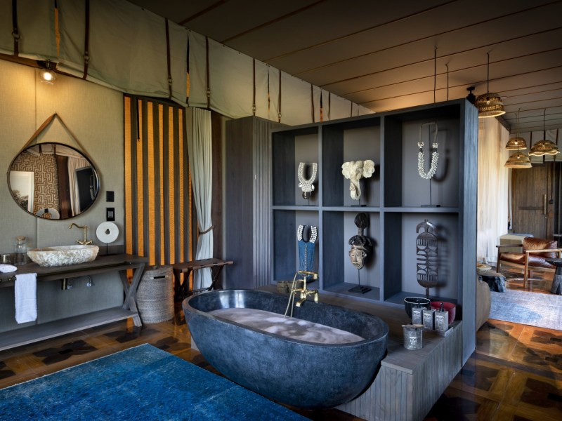 A luxurious bedroom in the okavango delta, Atzaró Okavango Camp