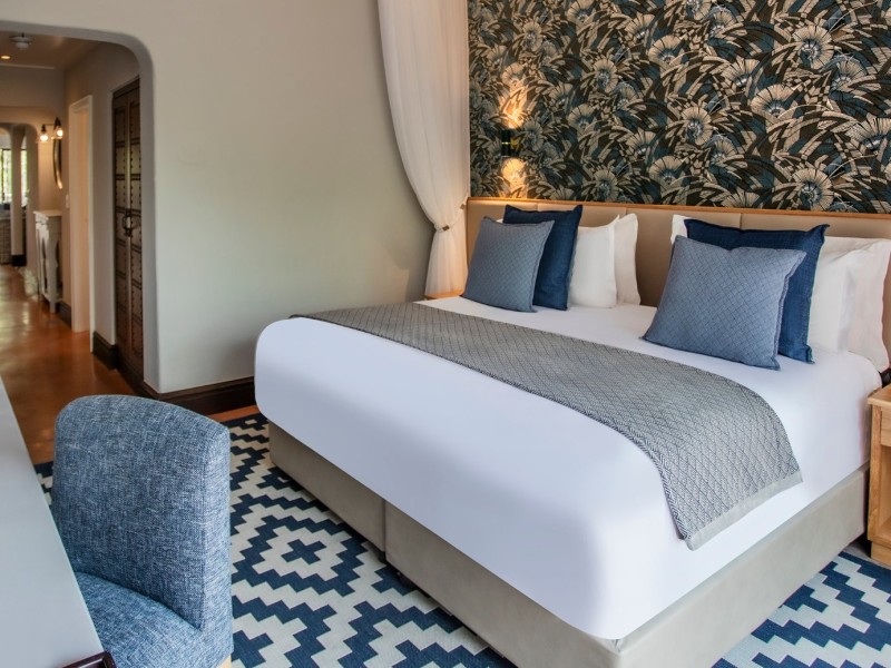 Lagoon View Suite bedroom and passage, Avani Victoria Falls Resort