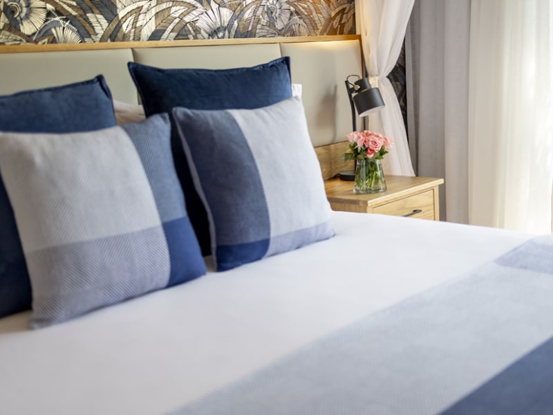 Superior room bed detail, Avani Victoria Falls Resort