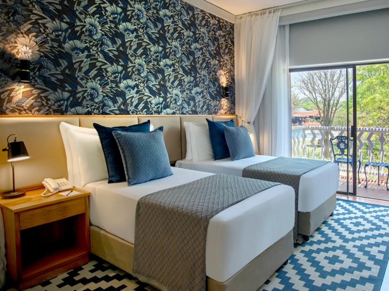 Superior Pool View Room with twin beds, Avani Victoria Falls Resort
