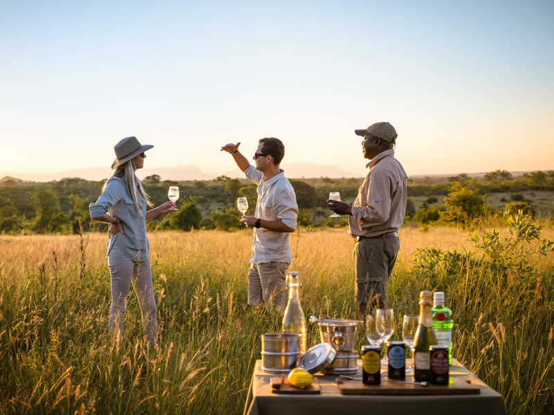 Bush Dining Experience Sundowner Stop at Singita Boulders Lodge