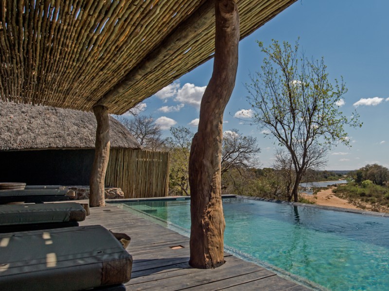 Ebony Villa Pool Patio and view of Bush 2 1 at Singita Ebony Villa