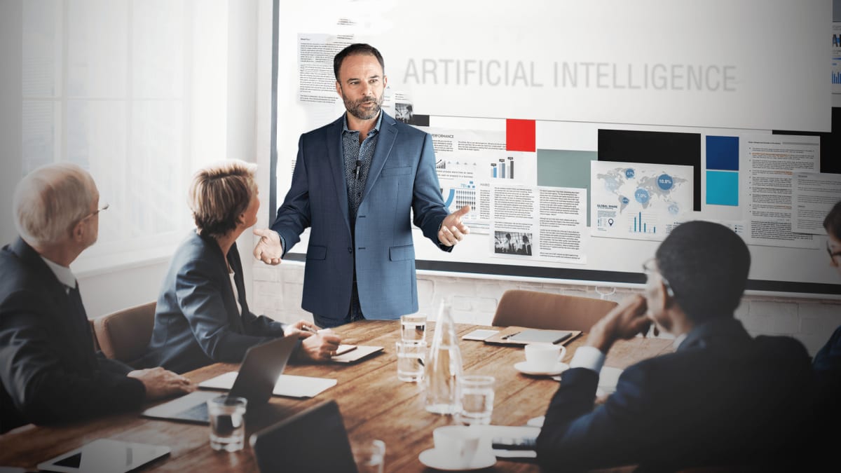 Brad Costanzo presenting to an executive team at a board on artificial intelligence