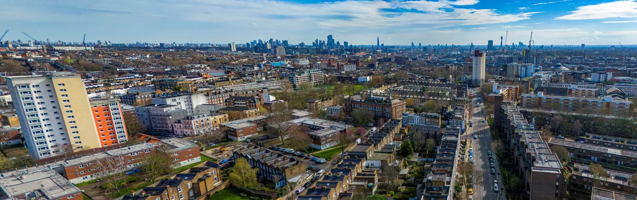 A panorama image across London with skyscrapers in the skyline.