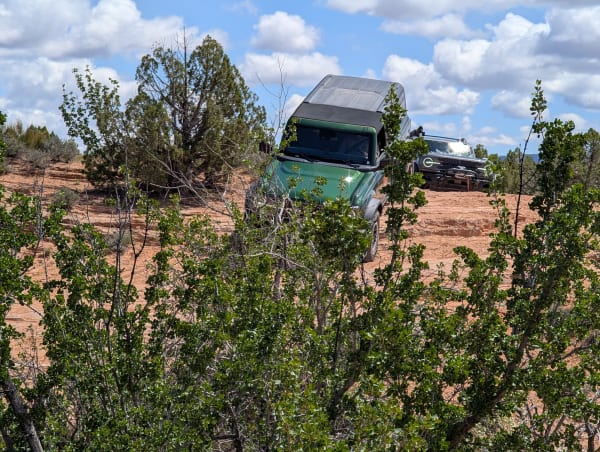 Bronco going down rocks