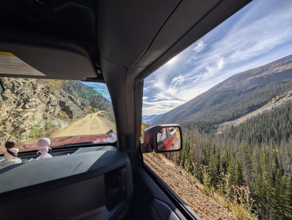 bronco driving on shelf road