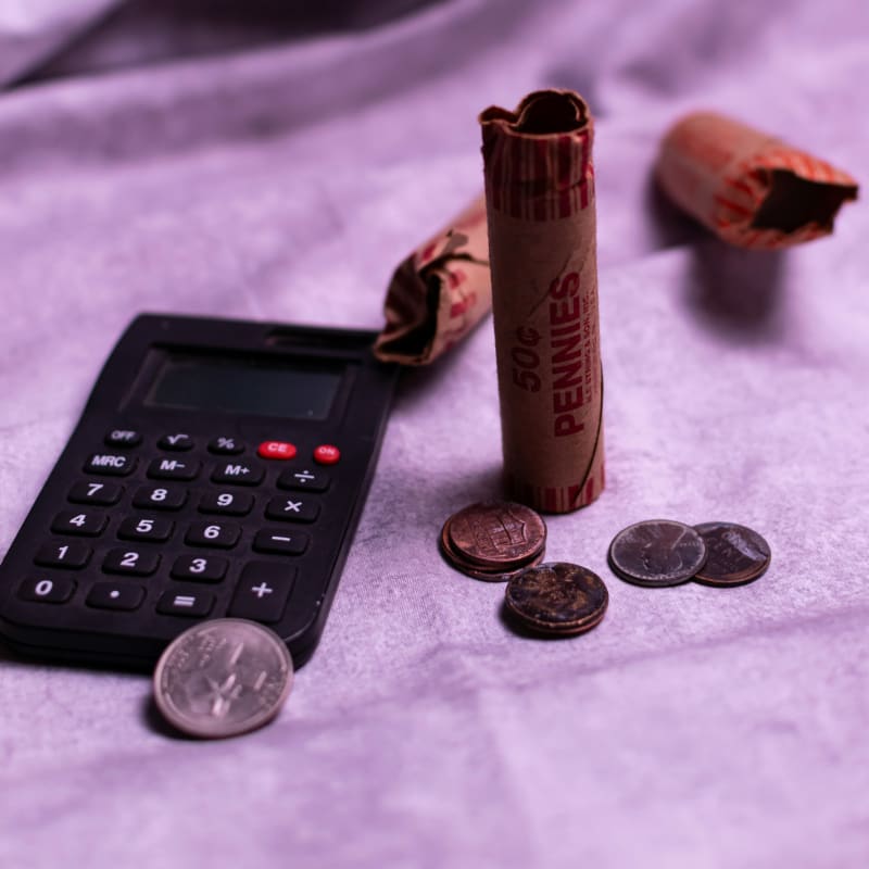 Calculator and money for AVE exam financial planning