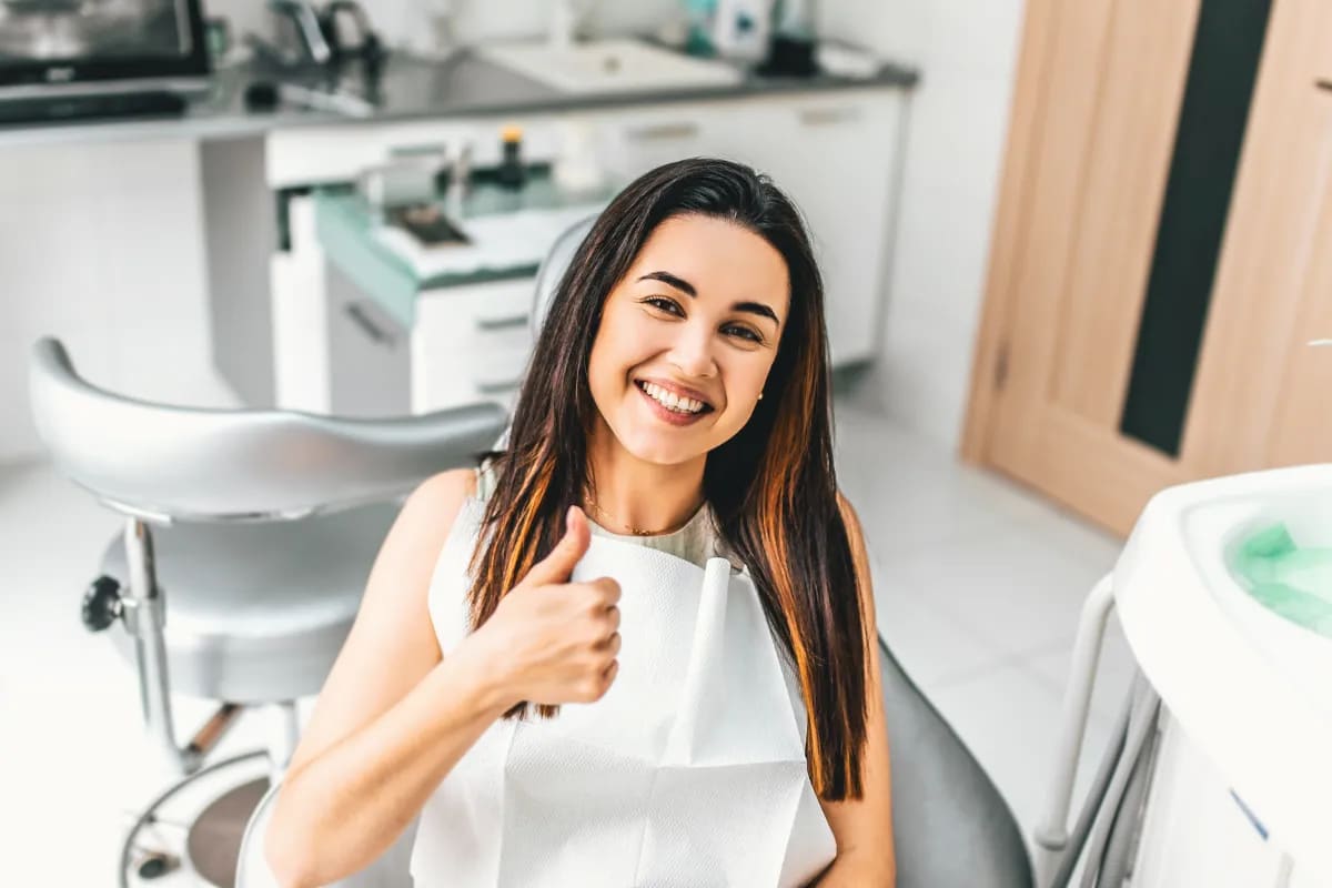 New Patient Special: $99 Exam & X-rays in Plano - Is It Worth It?, Plano, TX Smiling woman after dental checkup