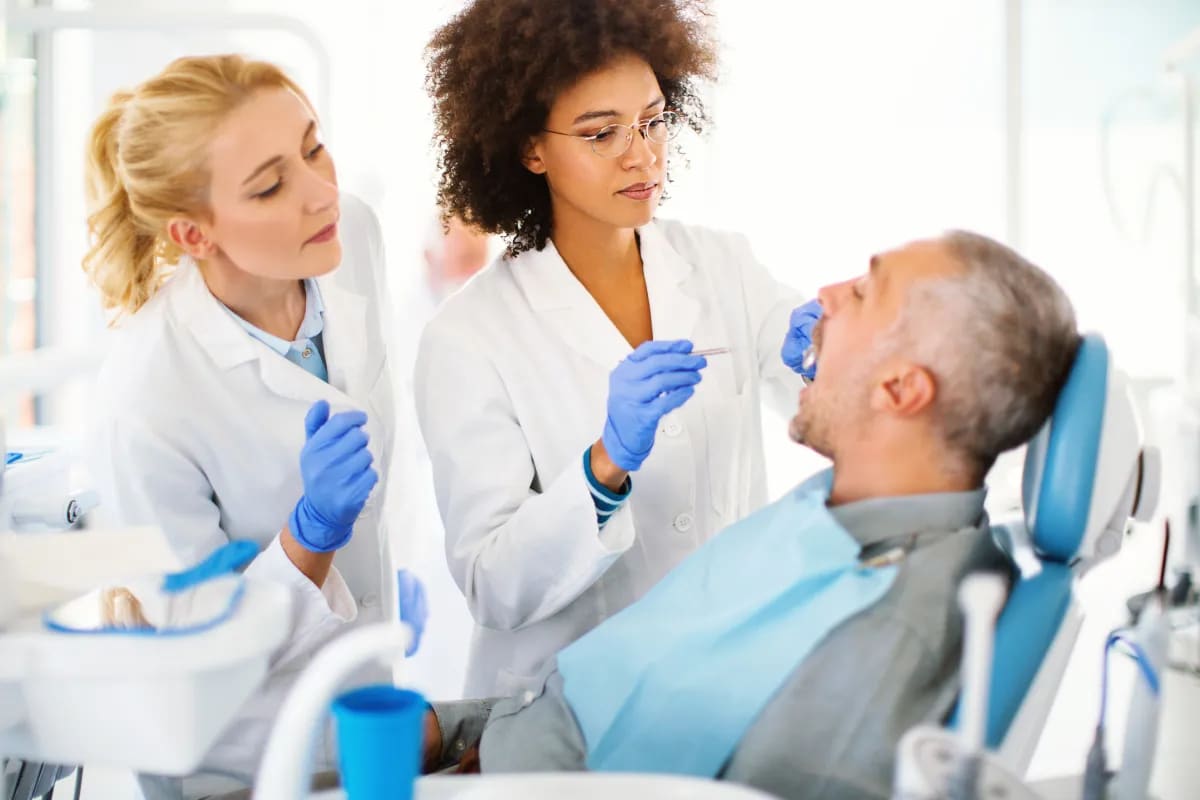 Routine Exams: Maintaining Optimal Dental Health in West Plano, Plano, TX Dental hygienist performing professional cleaning
