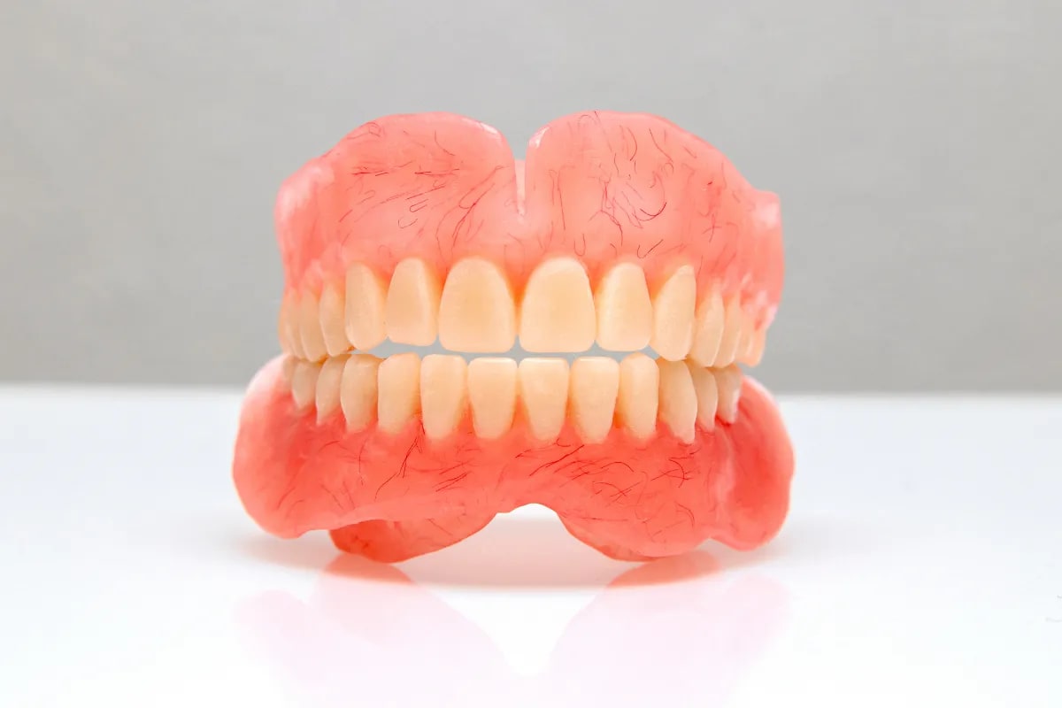 Complete Guide to Full Dentures: Regain Your Smile in Plano Near 75023, Plano, TX Smiling woman with dentures