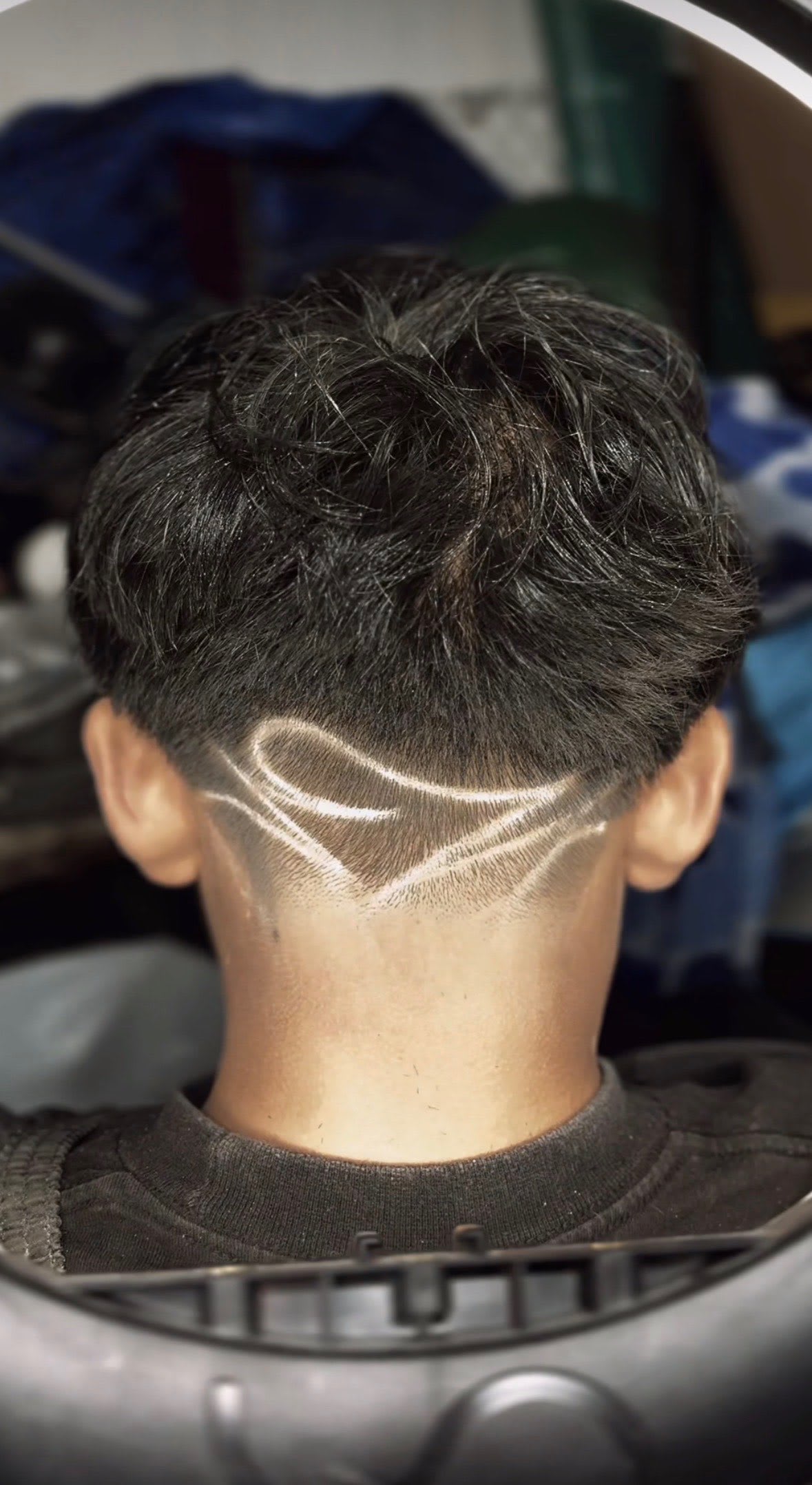 Side profile of a taper fade/mullet