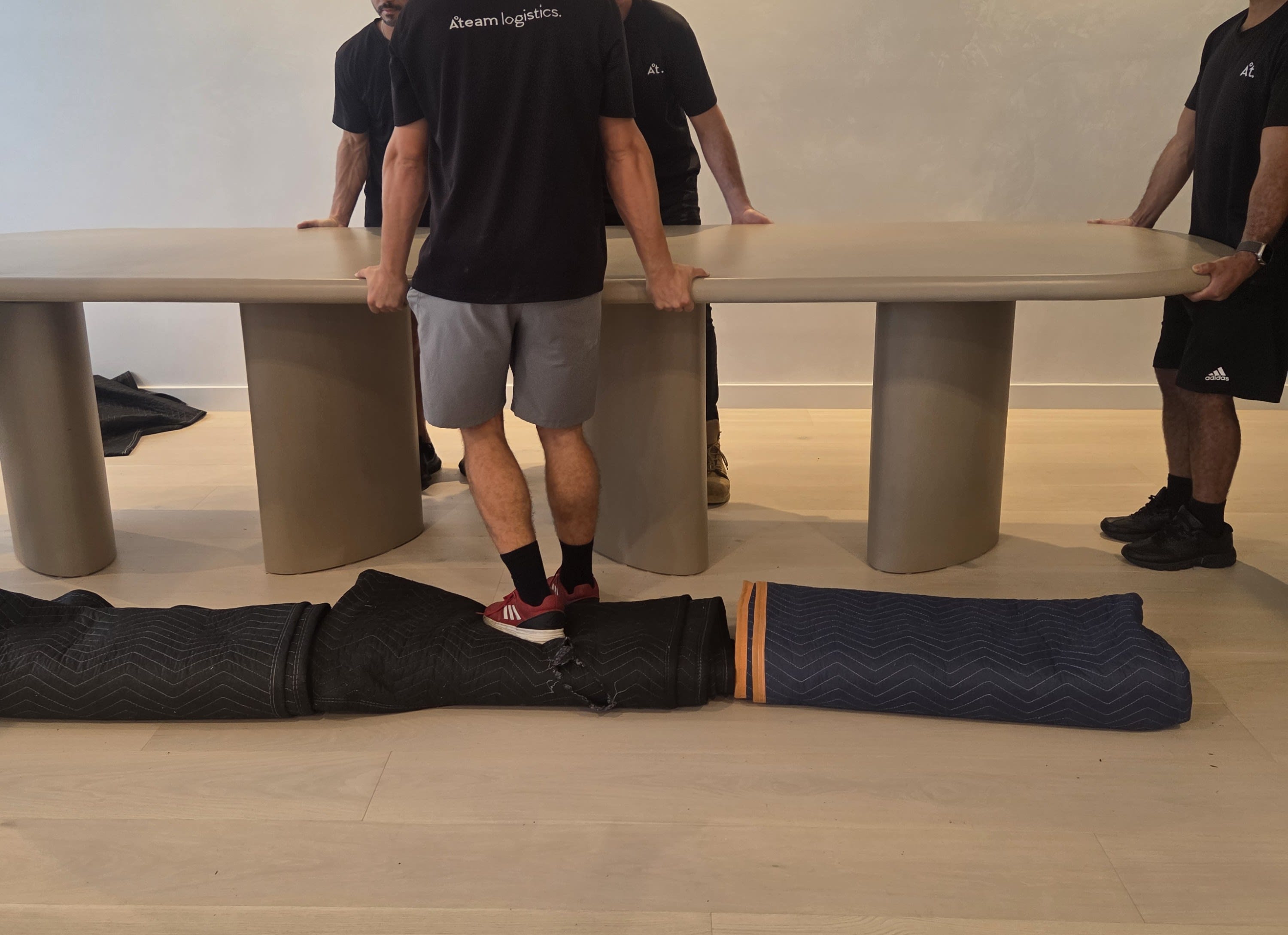 Installation team assembling the table top